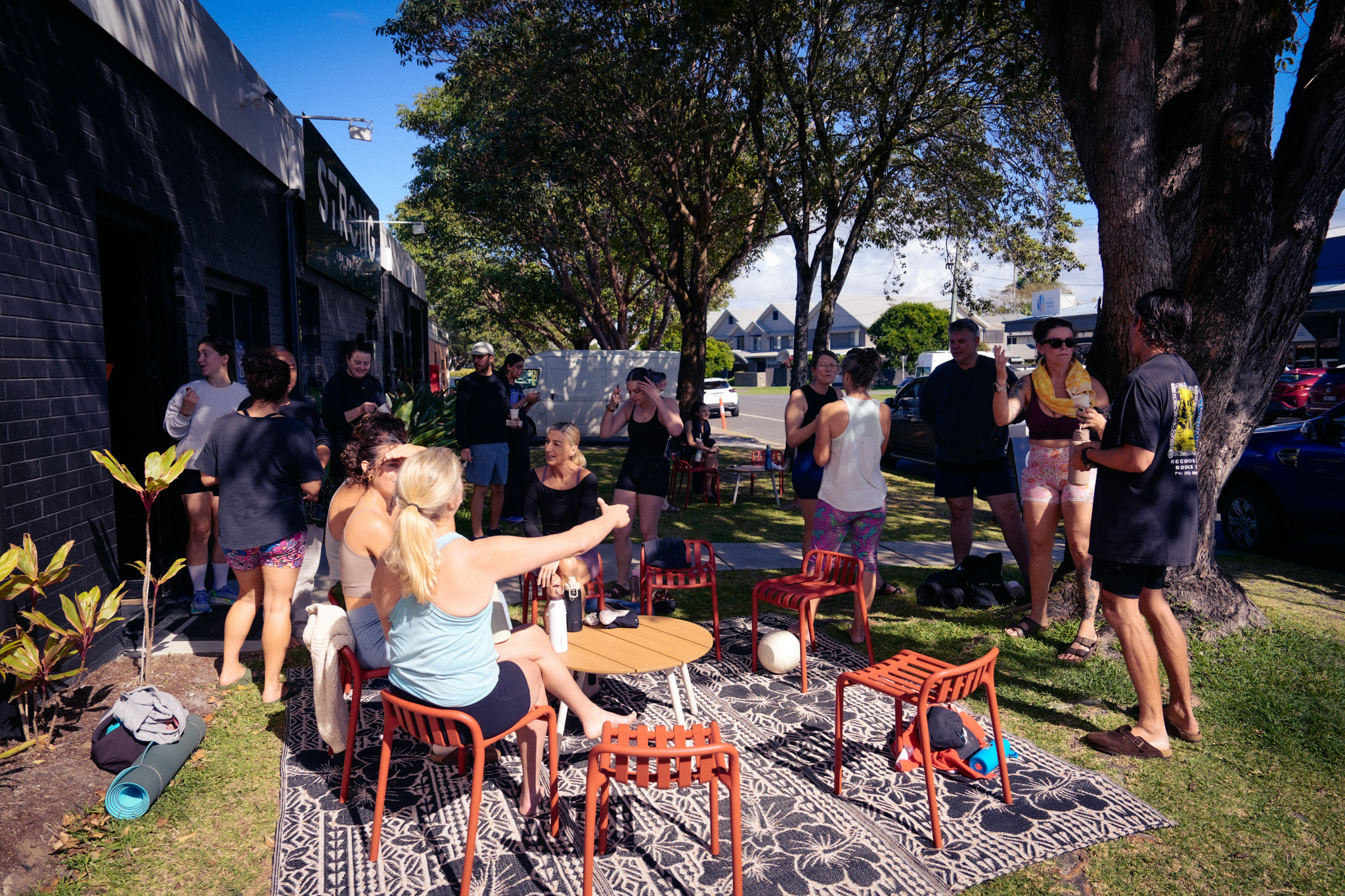 People chatting outside Flow on opening day